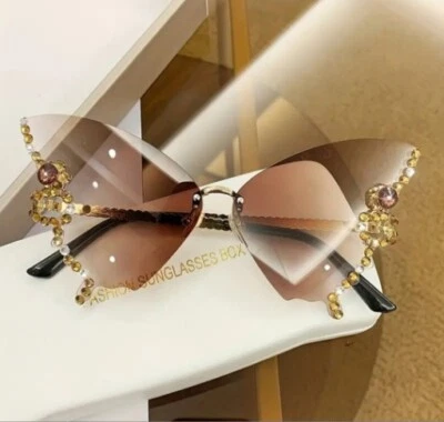 Nuevas gafas de sol mariposa sin bordes joyas gafas de sol para mujer diamante mariposa Foto 1 de 4