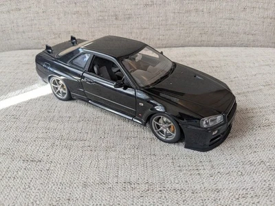 AUTOart NISSAN SKYLINE GT-R (R34) 1/18 (Negro Perla) **LEER PARA IMPERFECCIONES** Foto 1 de 4