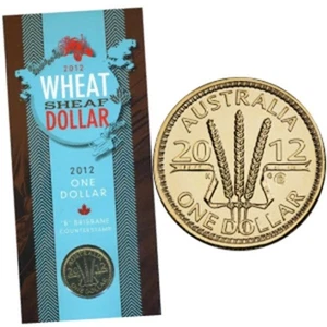2012 Uncirculated $1 Coin on card " Wheat Sheaf Dollar " B Counterstamp - Picture 1 of 2