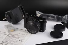Cámara digital Nikon 1 J5 20,8 MP - kit negro con recuento de obturadores de lente de 10-30 mm 1624