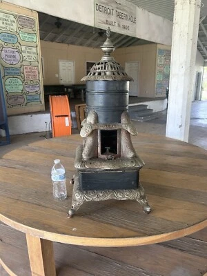 Antique Cast Iron Victorian Stove Rare Art Laurel Number 10 Wooden Wheels - Image 1 of 4