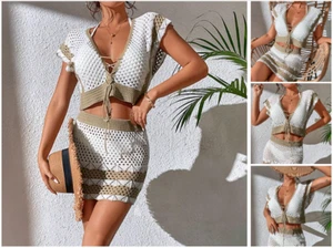 Tuta da spiaggia con protezione solare gonna corta in camicia cava con spalline - Foto 1 di 25