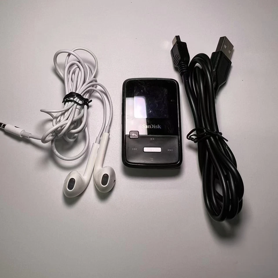 Reproductor multimedia digital SanDisk Sansa Clip Zip (4 GB) MP3 y paquete de cable usado Foto 1 de 4
