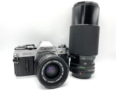 Canon AE-1 SLR 35mm Film Camera & FDn 35-70mm & 70-210 F/4 Zoom Lens Set DDP - Image 1 of 4
