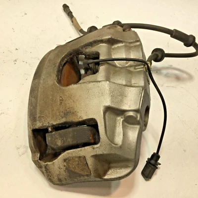 PINZA DE FRENO DELANTERA IZQUIERDA AUDI A6 2012-2017 OEM Foto 1 de 4