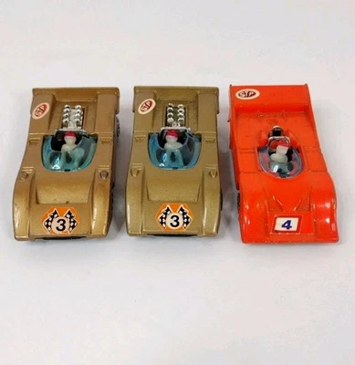 Tin Toys W.T. 503 Lot Of 3 McLaren M8A Porsche Audi Copper Orange - Image 1 of 4