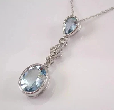 Colgante para mujer aguamarina de corte ovalado de 2,80 quilates enchapado en oro blanco de 14 k Foto 1 de 4