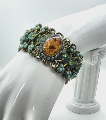 Pulsera ancha querubín turquesa Michal Negrin cristales esmalte faltan x3 piedras Foto 1 de 4