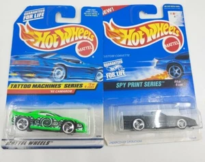 Hot Wheels Spy Print Corvette & Tattoo Machines Series Camaro (Sealed, New) - Picture 1 of 3