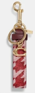 Nuevo con etiquetas Bolso de bucle Coach CK069 con estampado de diente de perro en rosa/rojo - Imagen 1 de 3
