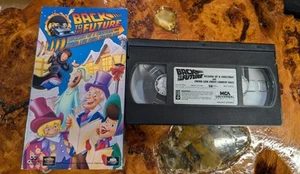 BACK TO THE FUTURE DICKENS CHRISTMAS & SWING LOW SWEET CHARIOT RACE (VHS, 1993) - Picture 1 of 3