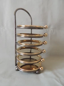 Beautiful bronze coasters set in a metal holder - Picture 1 of 10