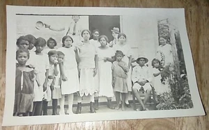RPPC POSTCARD PHOTOGRAPH ALL BLACK SCHOOL. CHILDREN EATING APPLES. CIRCA 1920. - Picture 1 of 4