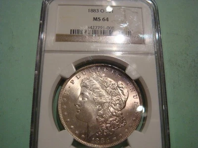Beautiful 1883 O Morgan Silver Dollar MS64 nice edge toning NGC - Image 1 of 2