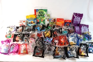 42 Teile großes Konvolut McDonalds Happy Meal Spielzeug 1986 Dalmations, Barbie, Ty Boo, Mario - Bild 1 von 15