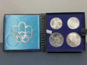 Juego de cuatro monedas de plata .925 de los Juegos Olímpicos de Montreal de Canadá 1976 en RCM OGP (GJ) - Imagen 1 de 6