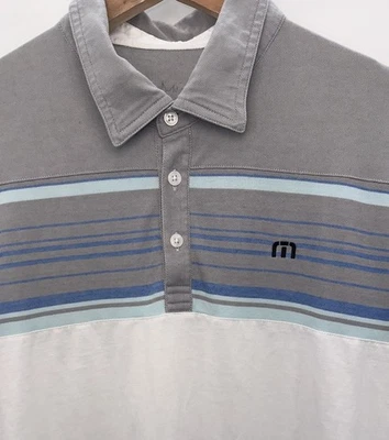 Polo de golf Travis Mathew Performance mediano blanco gris azul Foto 1 de 4