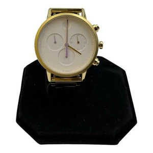 Banda enchapada en iones de oro punto cóncavo blanco esfera multicolor Movado Face - Imagen 1 de 10