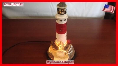 LIGHTHOUSE,12-3/4" APROX,7" DIAMETER BASE,6' CORED WITH SWITCH,LIGHTS UP - Image 1 of 4