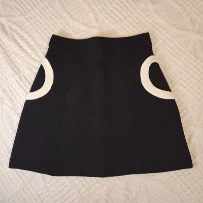 Falda H&M Negra Línea A Talla 10 Blanca Bolsillos Circulares Forrada Crepé Cremallera Trasera Retro Foto 1 de 4