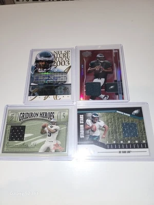 Tarjetas de reliquia de camiseta Donovan McNabb Auto Blue Ink (AU) SP + 3 SP usadas en juegos (GU) casi nuevas Foto 1 de 4