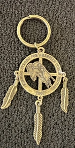 Schlüsselanhänger Running Strong für indianische Jugendliche 2007 Mandala-Stil Metall - Bild 1 von 3