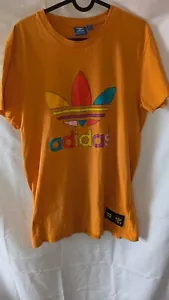 Camiseta Adidas Originales Pharrell Williams Naranja Brillante Grande - Agujero Pequeño - Imagen 1 de 6