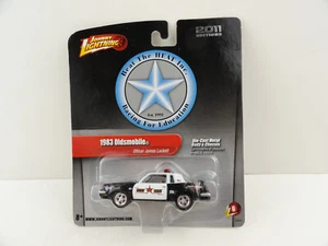 Johnny Lightning 2.0 R6 1983 Oldsmobile Cutlass Police (Beat the Heat) - Picture 1 of 6