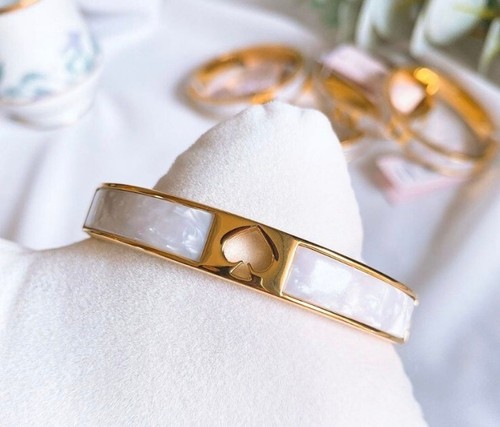 Cerniera Kate Spade Hole Punch Spade 10 mm vanga bracciale crema multi perlacente