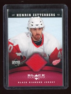 2006-07 Black Diamond Jerseys Ruby #JHZ Henrik Zetterberg 63/100 *S2424