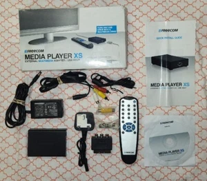 Reproductor multimedia de red Freecom XS adaptador multimedia externo host USB con control remoto - Imagen 1 de 18
