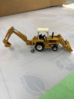 ERTL 1/64 Scale International Harvester Backhoe Loader Mighty Movers Collectible - Image 1 of 4