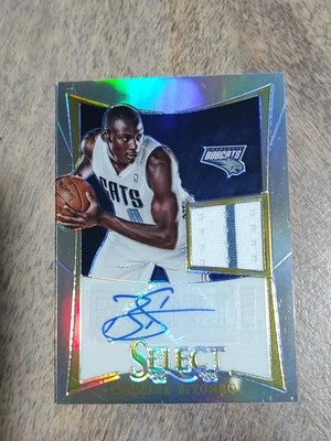 2012-13 Panini Select - Bismack Biyombo #242 Silver Prizm /199 (AU, MEM, RC) - Image 1 of 2
