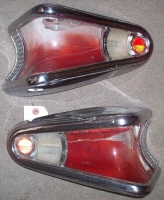 1957 Mercury Monterey / Turnpike Cruiser Left & Right Rear Tail Light Bezels 57 - Image 1 of 4