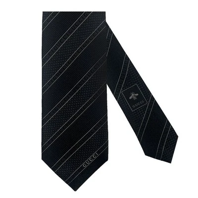 Corbata a rayas Gucci 499694 4B002 1000 negra 131327000 Foto 1 de 4