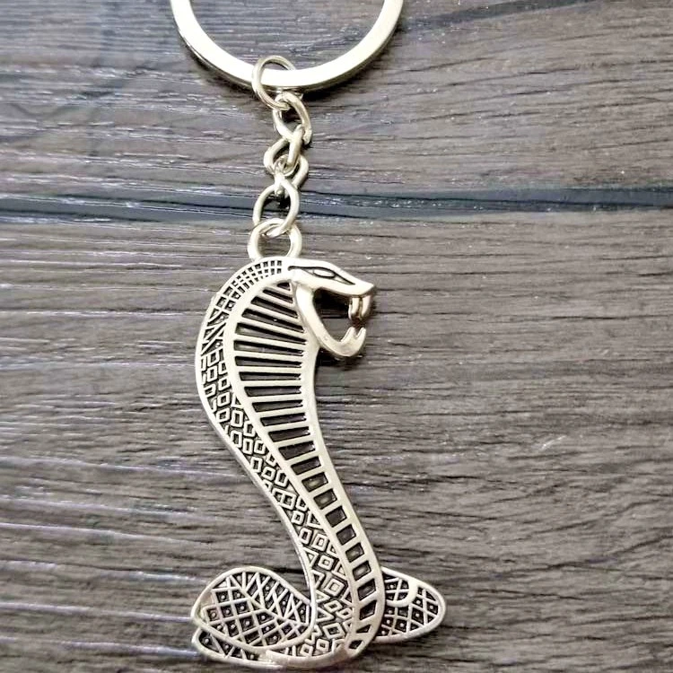 Llavero de metal con logotipo de Ford Mustang Cobra, encanto, llavero 1993 a 2021 carreras Foto 1 de 4