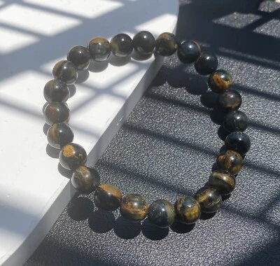 Brazalete de cuentas redondas de piedras preciosas de Namibia de pietersita azul amarillo natural 8 mm Foto 1 de 3