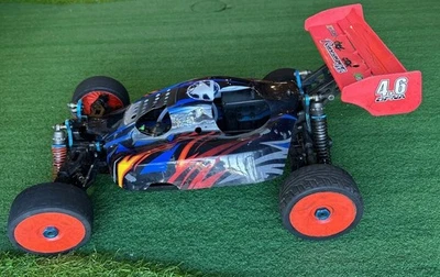 Vintage OFNA Ultra Comp LX Nitro Powered Buggy 1/8 Scale Roller - Image 1 of 4