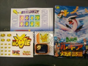 Pokemon Pikachu Movie Gold Pendant 3D poster stamps stickers Revelation Lugia - Picture 1 of 6