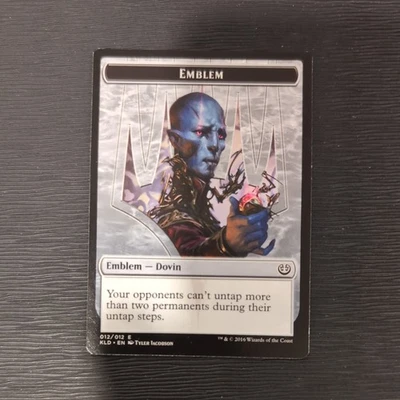 Dovin Baan Emblem NM/LP Kaladesh KLD #12 English Regular MTG  - Image 1 of 2