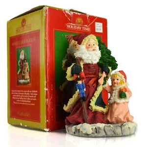 HOLIDAY TIME Weihnachtsmann Figur mit Mädchen im rosa Kleid Tischdeko - Bild 1 von 6