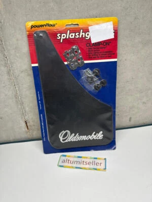 Protectores contra salpicaduras Oldsmobile NOS negros con Oldsmobile en cromo EE. UU. 12,5" de alto Foto 1 de 3