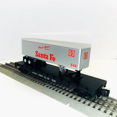 LIONEL #17502 AT&SF Flat Car with Santa Fe Piggy-Back Trailer - Image 1 of 4