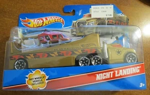 Transportista y vehículo de aterrizaje nocturno Hot Wheels. NUEVO SELLADO - Imagen 1 de 1
