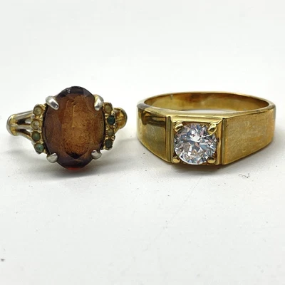 Lote 2 Anillos Bisutería Hombre Piedra Transparente Sello y Mujer Ovalado Marrón Verde Foto 1 de 4