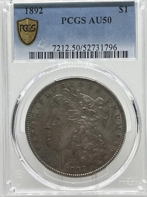 Dólar de plata Morgan 1892 graduación profesional escudo de oro AU 50 Foto 1 de 4