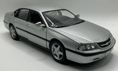 WELLY 2001  CHEVROLET IMPALA   1:24 SCALE SILVER RARE RARE FIND NEW - Image 1 of 4