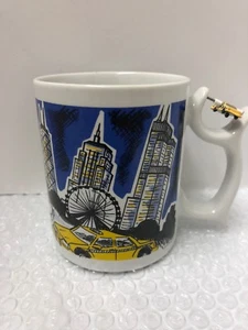 SPINNERS TAXI CHICAGO COFFEE MUG TEA BUCKINGHAM FOUNTAIN SEARS TOWER NAVY PIER - Picture 1 of 6