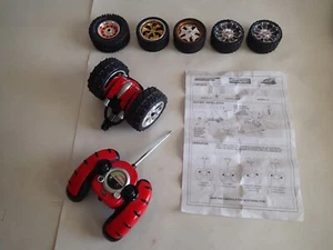 FLY WHEELS RADIO CONTROL VEHICLE w/Instructions & Five Extra Wheels, R/C Remote - Picture 1 of 7