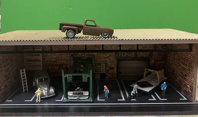 Hand Assembled - 1/64 Scale Diorama – “MO’ Eye” Auto Repair Shop - Image 1 of 4